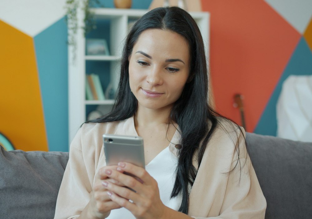 Woman reading on her phone
